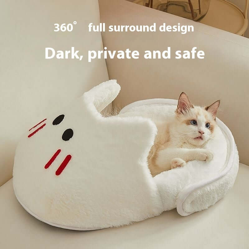 Fluffy cat in a white Universal Cat Nest bed with playful rabbit slipper design, providing a cozy and secure resting space.